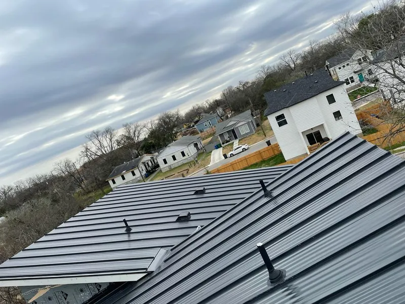 Standing seam metal roof panels with vents for Skylight Repair in Waunakee